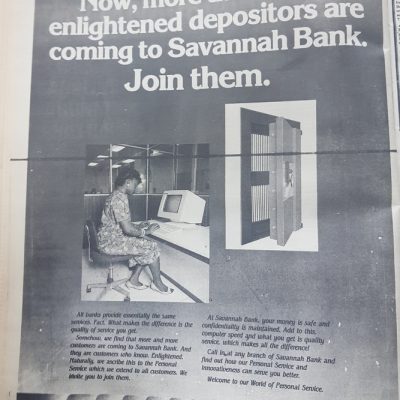 Savannah Bank Advert using image of Woman on a Personal Computer